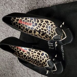 Demonia “Pixie-15” spiked peep toe high heel.